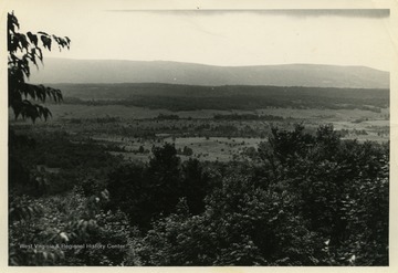 This image is part of the Thompson Family of Canaan Valley Collection. The Thompson family played a large role in the timber industry of Tucker County during the 1800s, and later prospered in the region as farmers, business owners, and prominent members of the Canaan Valley community.The location of this photograph is likely Canaan Valley, W. Va.