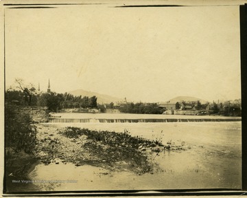 This image is part of the Thompson Family of Canaan Valley Collection. The Thompson family played a large role in the timber industry of Tucker County during the 1800s, and later prospered in the region as farmers, business owners, and prominent members of the Canaan Valley community.Scenic view of the Potomac River and Wills Creek in Cumberland, Maryland.