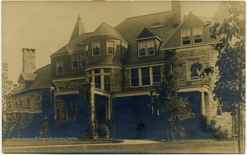 This image is part of the Thompson Family of Canaan Valley Collection. The Thompson family played a large role in the timber industry of Tucker County during the 1800s, and later prospered in the region as farmers, business owners, and prominent members of the Canaan Valley community.This mansion is now part of the Davis and Elkins College.