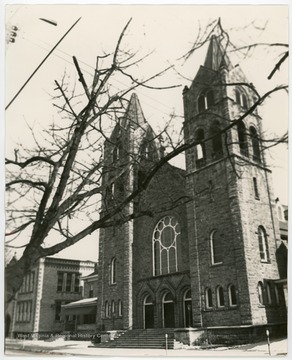 St. Patrick's Schools is to the left of the church in the picture.  The church was organized in 1845. The present church building was opened in 1915.