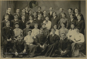 Music students at WVU pose together for a class photo. Olive Cordelia Knotts Cox is pictured in the third row, fourth from the left. 
