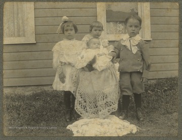 Pictured are "Mildred" Elizabeth; William "Herbert"; Eleanor "Geraldine"; and Janice "Albert". 