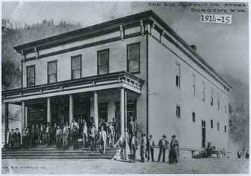 Men gather at the store's entrance. 