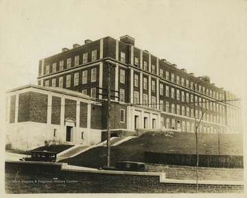 Clark Hall was the Chemistry Building located on the corner of University Ave. and Prospect St. To the right of the building and out of view is now the location of the Downtown Campus Library.