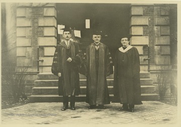 Turner, center, is pictured with two unidentified associates outside of a WVU building the day of his inauguration. 