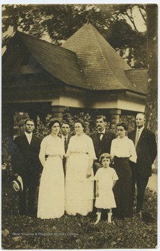 Third from right is W.T.W. Dye, M. D. To his front right is Sophia A. Dye. Other subjects unidentified. 