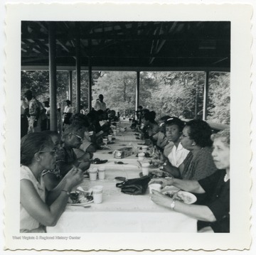 Members of the community gather for a picnic in Clarksburg, W. Va.