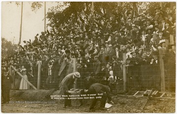 "Rooters when Marietta made a great play at Marietta - Morgantown foot-ball game." Photo postcard.