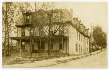 View of Woman's Hall, previously known as Episcopal Hall, located on the corner of Spruce and Willey Streets. Correspondence on the back reads, "This is the principal point of interest during the college year."
