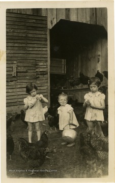 From left to right: Shirley Jeanne Farley, Margie Lois Farley, and Annette Sue Farley. Farm located on Bal Noble Road, Summers County, W. Va.