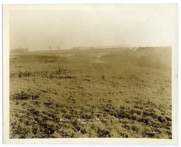 Text on the back reads: " 'C' Runway - from south side of runway at Station 25 and 50 - to east. Fill and 'cuts' to bring runway to grade - note grade poles."