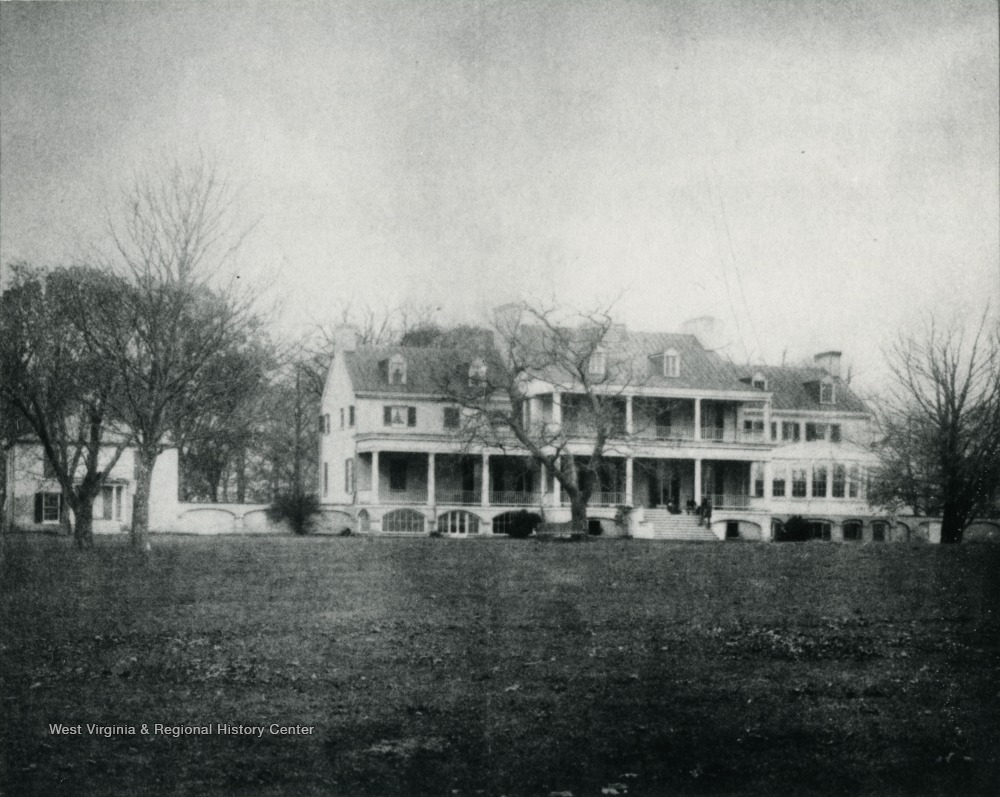 View of Claymont Court near Charles Town. The ante-bellum mansion was built in 1840 by Bushrod Corbin Washington, after the first dwelling burnt down in 1838. Washington was George Washington's grand-nephew. The mansion has a formal ballroom and two-story, columned porches. 