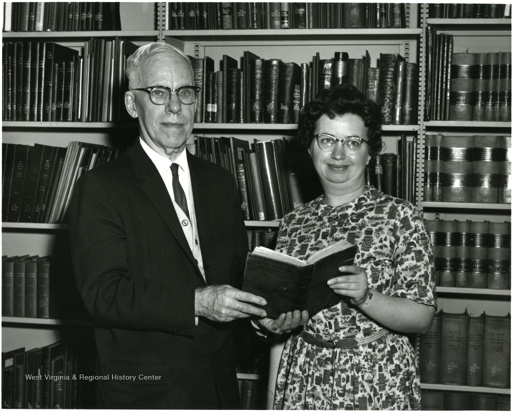 Joan Ellis and Man Holding a Book, West Virginia University West
