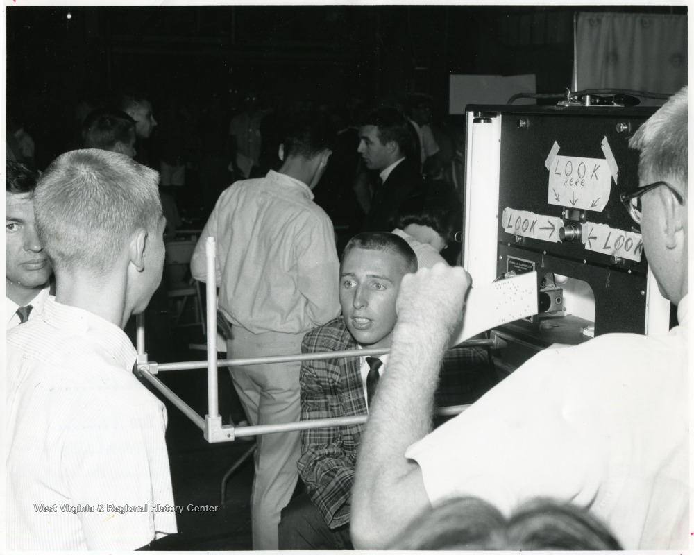 getting-photographed-during-registration-at-the-field-house-west-virginia-university-west