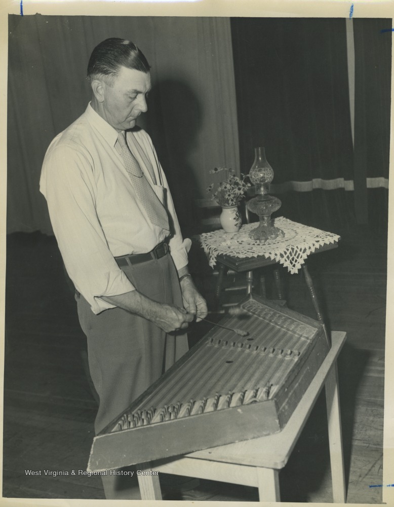 Keith Simmons Performing On A Dulcimer At Glenville Folk Festival 