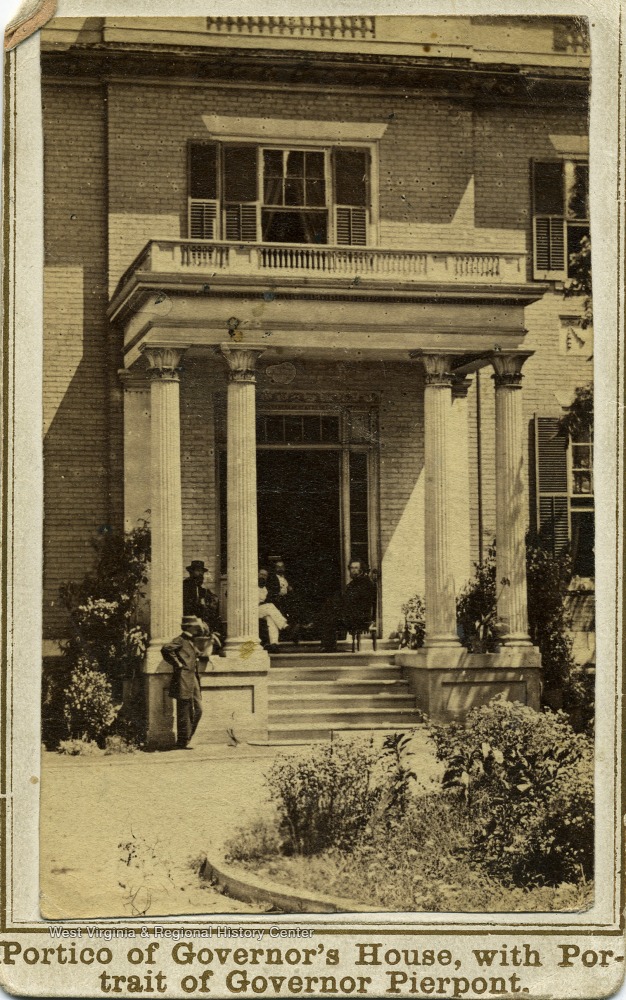 'Portico of Executive Mansion. During the Rebellion this Mansion was occupied, in their respective terms by the Rebel Governors, Letcher and Smith, and is now the residence of Gov. Pierpont, who may be seen seated on the left of the portico, in company with Messrs. W.W. Weng, Treasurer of Virginia, W.D. Massey, P.M. of Alexandria, Va., and Colonel Hart of the Governor's Staff. Courtesy Mrs. J.C. Pryor'
