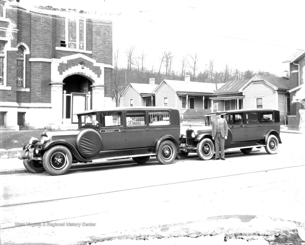 Triple State Electric Company Employee Beside Bartlett Cars West 