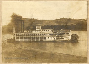 Steam packet "City of Wheeling" conveying church goers on a Sunday school excursion.  This picture shows the boat "docked" on the shore of the Ohio River at Narrow's Run. 