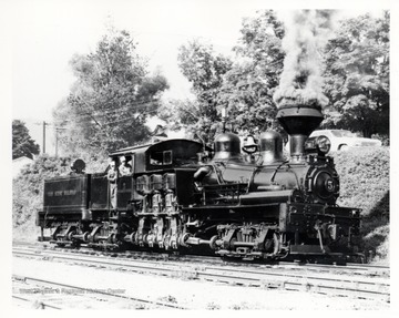 Locomotive engine with conductors. Cass Scenic R.R. Cass, WV; Artie Bailey in the door; "Doc" Carlson at the throttle.