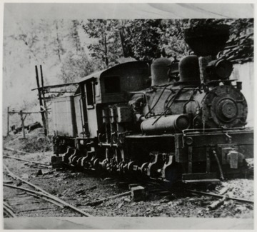 3/4 front view of Shay train engine.  