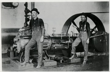 Mill engine with two workers:  Scott Lockard and Roy Cook.  