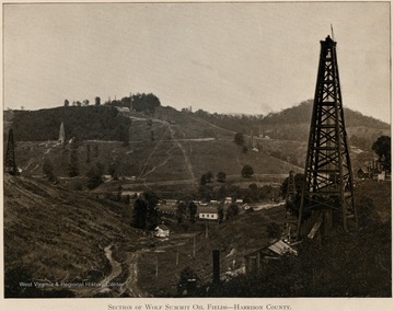 Oil field in a hilly area, oil derricks are visible.   From Grant's Photograph Record of West Virginia.