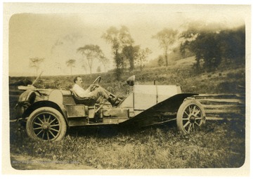 Friend of Louis Bennett, Jr. driving a car.  Photograph from M. Graham, 622 W. 114th Street, New York, New York.