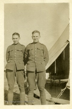 Candid portrait of two World War I Soldiers at Taliaferro (Hick's Field), Fort Worth, Texas in January 1918.