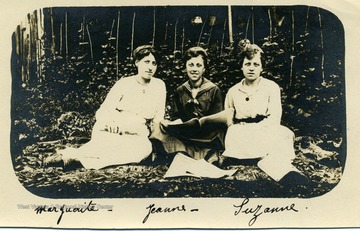Postcard portrait of three ladies, Marguerite, Jeanne, and Suzanne.  Back of postacard reads 'Un souvenir de votre bonne visite a Ouv. Nos meilleurs respects, J. Vallee' (A souvenir of our good visit to Ouv.  Our many respects, J. Vallee.) Accompanied letter from Jeanne Vallee to Mrs. Louis Bennett, 24 August 1919.