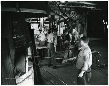 Portrait of men working in the Fostoria Glass Co. Plant in Moundsville, W. Va.