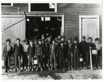 Group portrait of boys going home from Monongah Glass Workers, Fairmont, W. Va.  Credit National Archives 102-LH-185. <br /><br />
