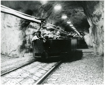 Miner in electric locomotive at the Willow Grove Haulageway, Pittsburgh Consol. Coal Co. 