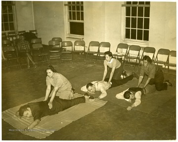 First aid class being taught at W. Va. State College where students and teachers were trained by the Extension Service during the second World War.