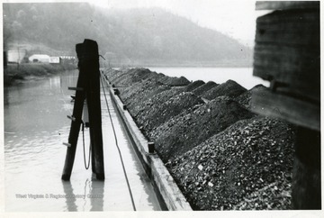 Coal on a barge outside of Granville, 1943.