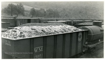 Western Maryland Coal Car No. 15951 with other cars in background. Taken at Thomas, W. Va. 