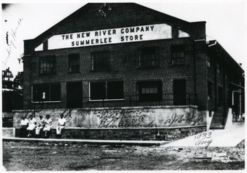 The Summerlee Store at the Summerlee Mine of the New River Company. The people sitting in front of the store from right to left; Harry Stamper, Lola Lewis, A.R. Long, Delia Alexander, A.J. Bishop.