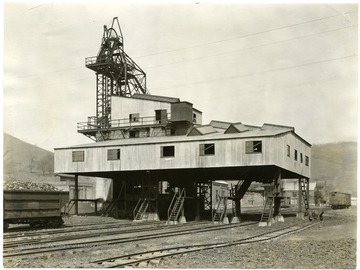 A coal filling station stands over the tracks at Mine 86.