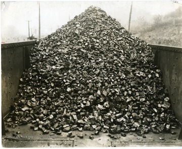 A pile of coal in a coal car.