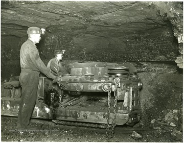 Two men cutting coal in the parting.