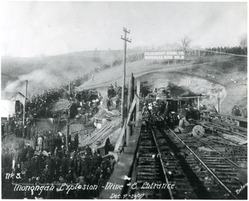 Crowds line the hillside above and gather near the entrance to mine no. 8 after the disaster.