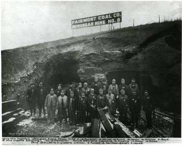 Group portrait of inspectors and mine experts from West Virginia and Ohio standing in front of Mine No. 8 at Monongah, W. Va.