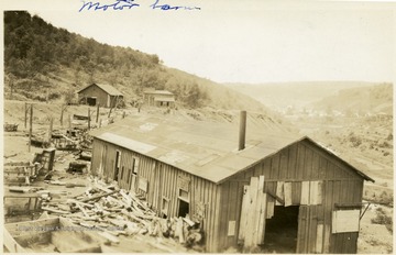 Wood and debris surrounding the motor barn at Mine No. 36, Thomas, W. Va.