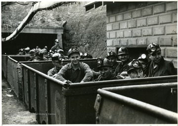 Miners in cars about to go down to the pit.  Photograph courtesy of the Farm Security Administration.