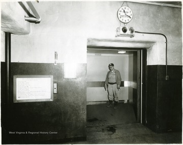 Miner standing in portal to Jamison No. 9.