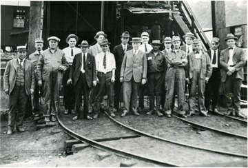 Group portrait of people at the top of Summerlee Shaft.