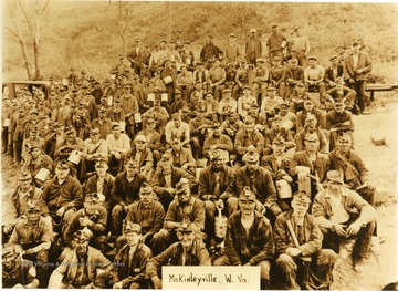 Group portrait of miners which includes several African-Americans. None of the miners are identified.  