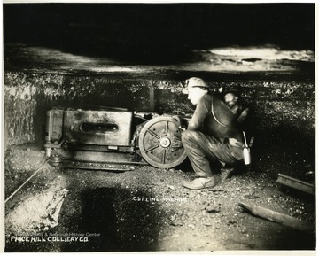 Miner operating a cutting machine.