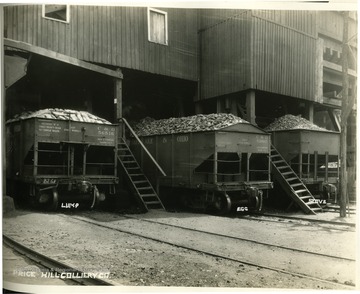 Chesapeake and Ohio railroad cars filled with three different types of coal.