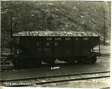 Chesapeake and Ohio railroad car filled with lump coal.