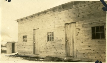 Set of doors to wooden barracks.